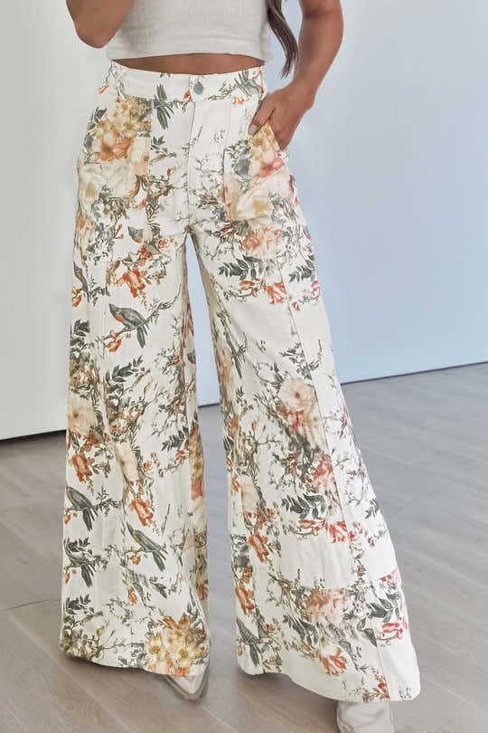 Jeans beige stile vintage con stampa floreale a vita alta e gamba larga - Moda femminile Immagine 1