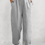 Pantaloni della tuta in vita elastica a croce grigio chiaro e unico,