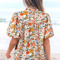Mehrfarbige Häkelbluuse mit V-Ausschnitt und Puffärmel Boho-Blumenbluse - Foto 2