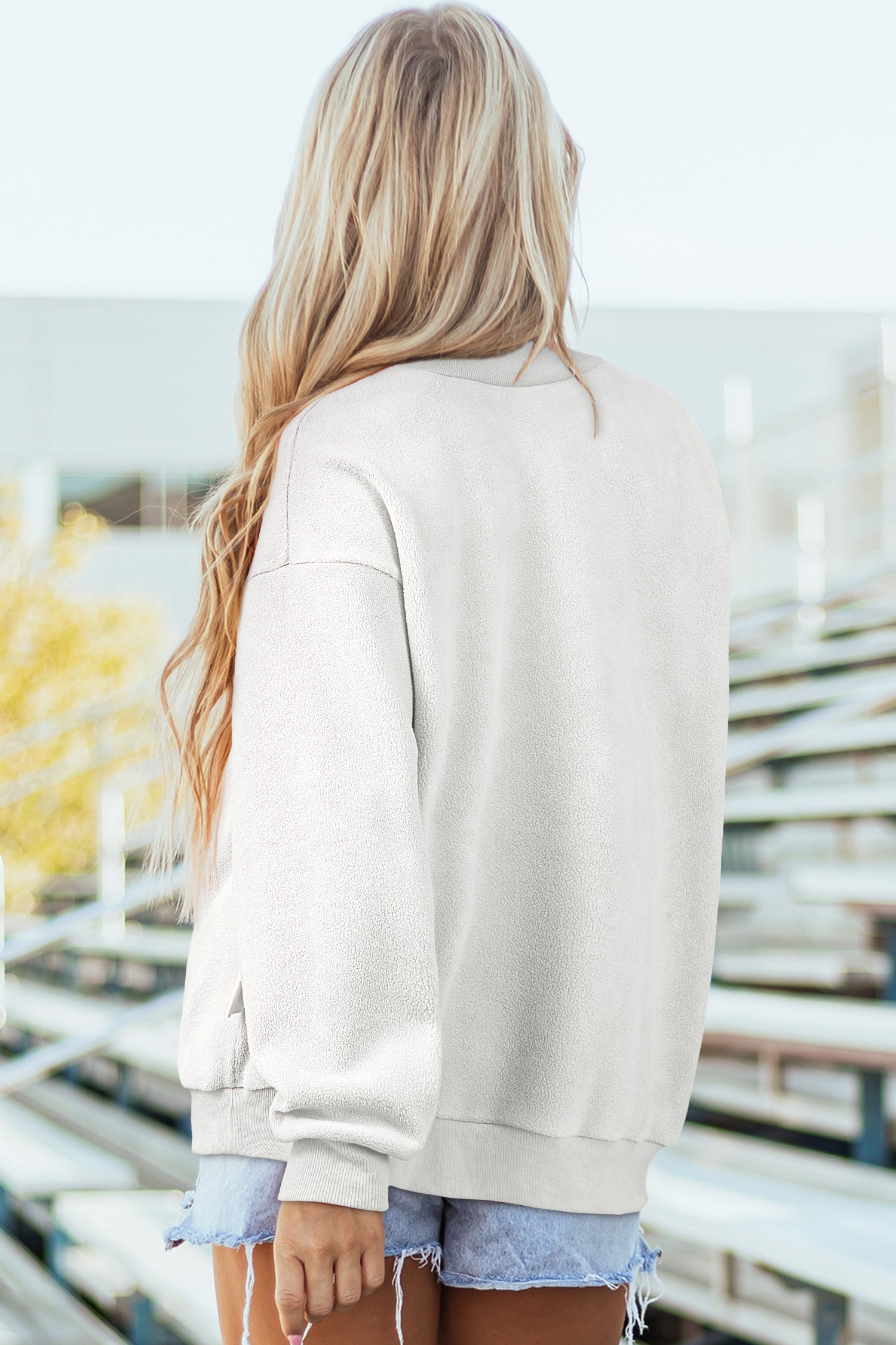 Sweat-shirt bleu foncé oversize, épaule tombante et réversible, col montant,