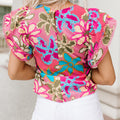 Mehrfarbige, lebendige Bluse mit Blumenmuster und Rüschenärmel - Foto 5