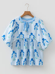 Himmelblå bluse med blomsterprint med slipshals og puffærmer - Miniatuur