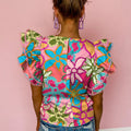 Mehrfarbige, lebendige Bluse mit Blumenmuster und Rüschenärmel - Foto 2
