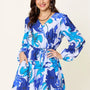 Double Take Full Size Floral Long Sleeve Romper with Pockets
