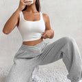 Hellgraue, einfarbige Jogginghose mit gekreuzter Taille - Foto 5