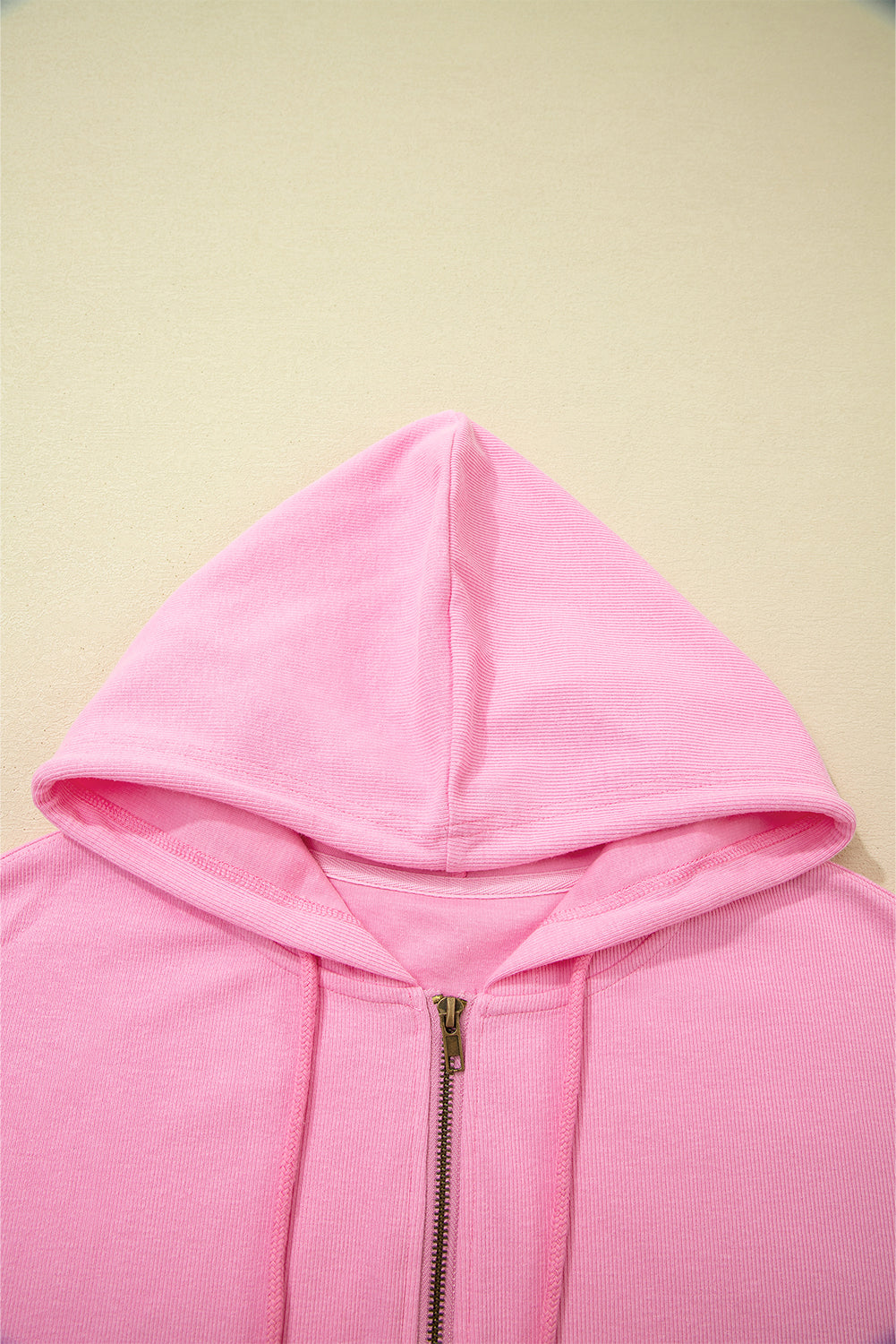 Sachet rose uni, veste à capuche à cordon nervuré