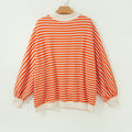 Maglietta a maniche lunghe oversize a righe a righe a righe arancioni con scollo tesserizzato - Foto 6