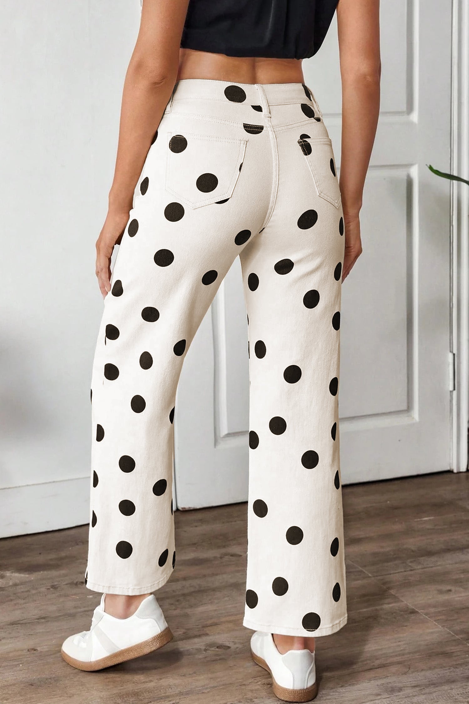 Jeans bianchi a pois larghi fino alla caviglia