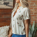 Camisa blanca de manga corta con solapa estampada de ánade real - Foto 3