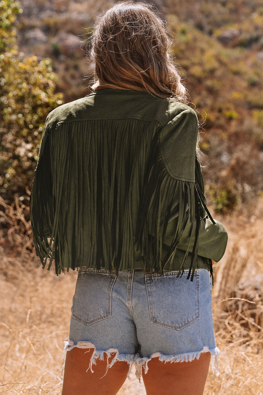 Veste verte à franges courtes en pseudo daim