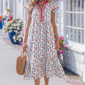 Vestido largo de manga relleno de manga relleno estampada de girasol azul cielo con ribetes de rayas y parches - Foto 4