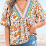 Camicetta a fiori boho a maniche a sbuffo all'uncinetto a V a crono