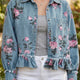 Dunkelblaue Jacke mit Blumenmuster und Rüschen-Saum