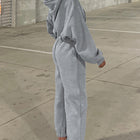 Set de ropa deportiva gris con capucha de hombro caído y pantalones deportivos - Thumbnail