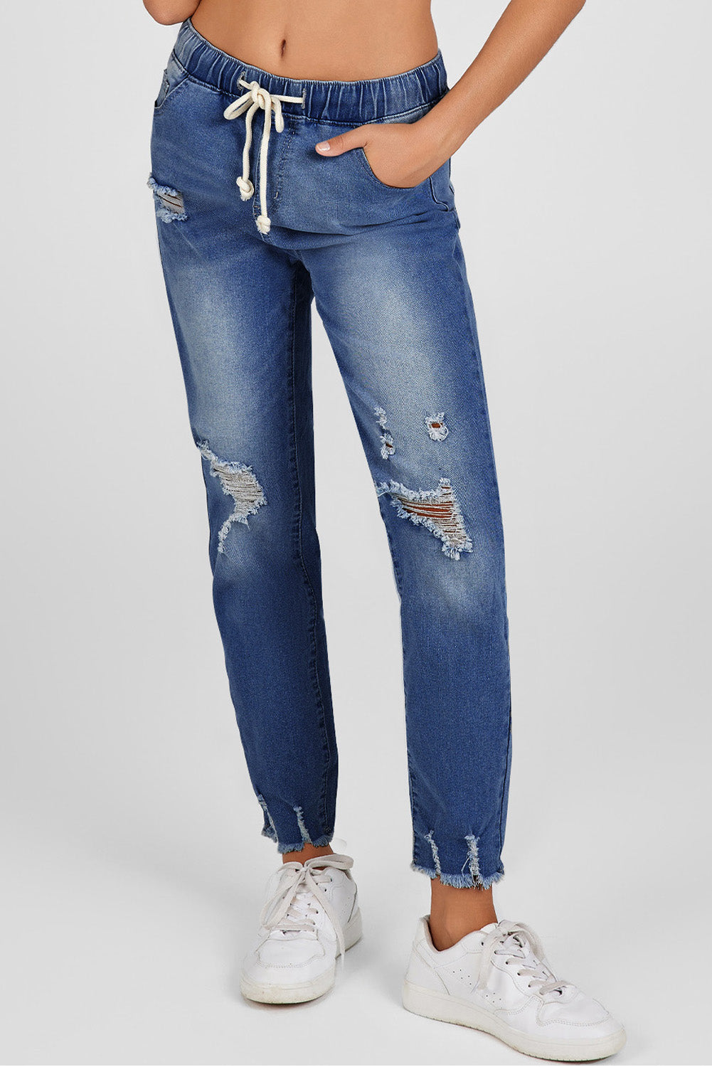 Dunkelblaue elastische Taille, gerade Beine zerstörte Rohsaum-Jeans