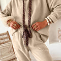 Pergament-Leopard-Kordelzugpullover und High-Waist-Hosen-Cordanzug - Foto 3
