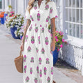 Grünes Maxikleid mit gespaltenem Schnitt mit geschnittenem Schnitt und Rüschensaum - Foto 4