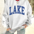 Hellgrauer Pullover mit Mock-Neck-Grafikdruck, drehbarer Pullover - Foto 6