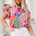 Mehrfarbige, lebendige Bluse mit Blumenmuster und Rüschenärmel - Foto 4