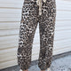 Schwarzer Luipaardprintenmuster mit Jogger-Jeans mit Kordelzug