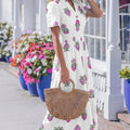 Grünes Maxikleid mit gespaltenem Schnitt mit geschnittenem Schnitt und Rüschensaum - Foto 6
