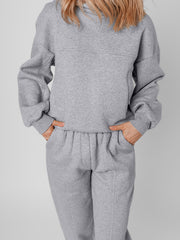 Ensemble de vêtements sportifs gris à coutures unis apparentes - Miniatuur