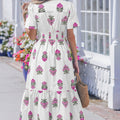 Grünes Maxikleid mit gespaltenem Schnitt mit geschnittenem Schnitt und Rüschensaum - Foto 5