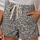 Pantalones cortos vaqueros vaqueros con patrón de leopardo multicolor con detalles de cordón