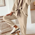 Pergament-Leopard-Kordelzugpullover und High-Waist-Hosen-Cordanzug - Foto 1