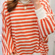 Maglietta a maniche lunghe oversize a righe a righe a righe arancioni con scollo tesserizzato