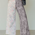Jeans leopardo retrò multicolore a toppe contrastanti con orlo grezzo - Foto 1