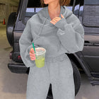 Set de ropa deportiva gris con capucha de hombro caído y pantalones deportivos - Thumbnail