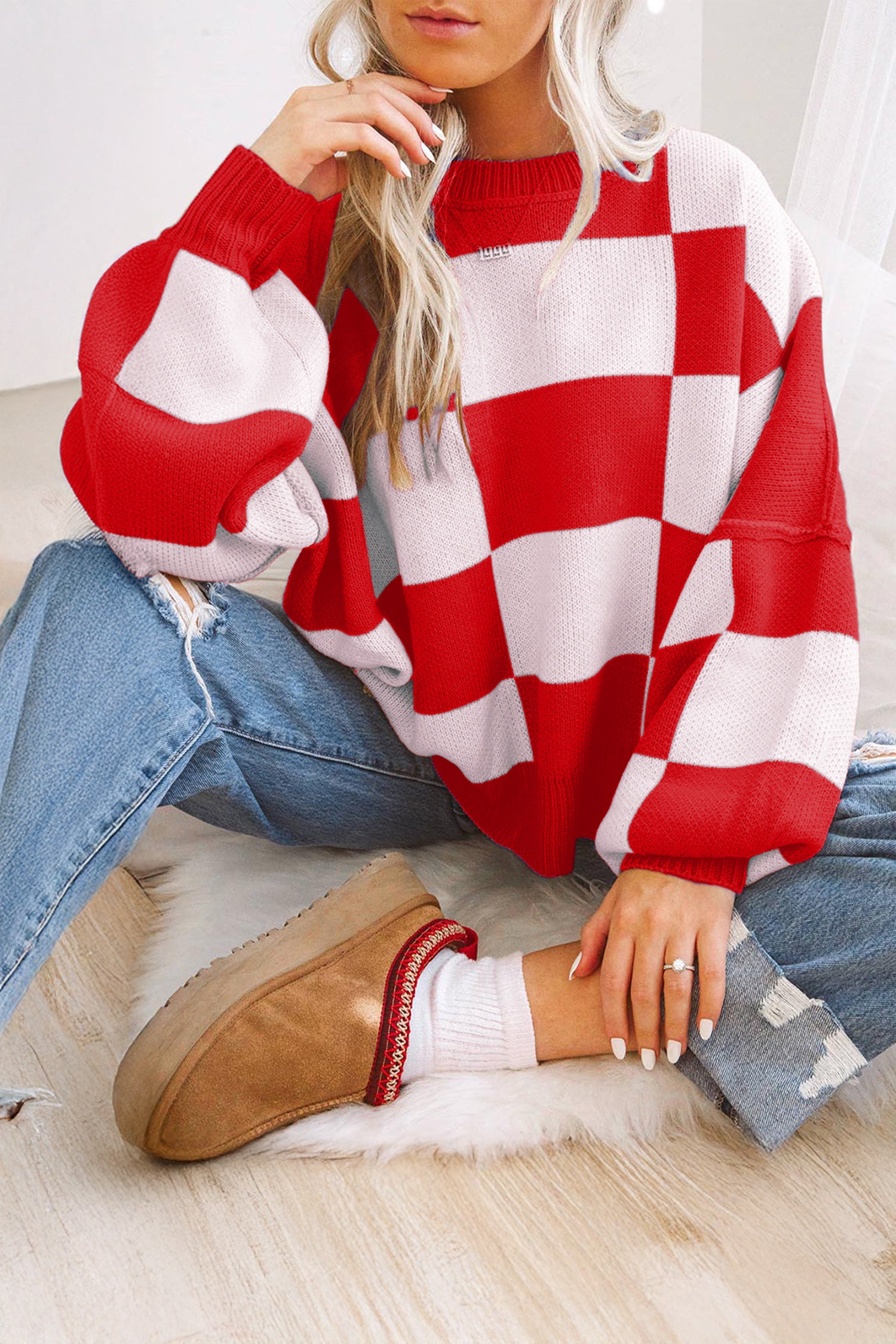 Pull à manches en damier rose à manches en évêque