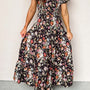 Schwarzes langes Maxikleid mit V-Ausschnitt mit V-Ausschnitt und gestuftem, gestuftem Langmaxikleid