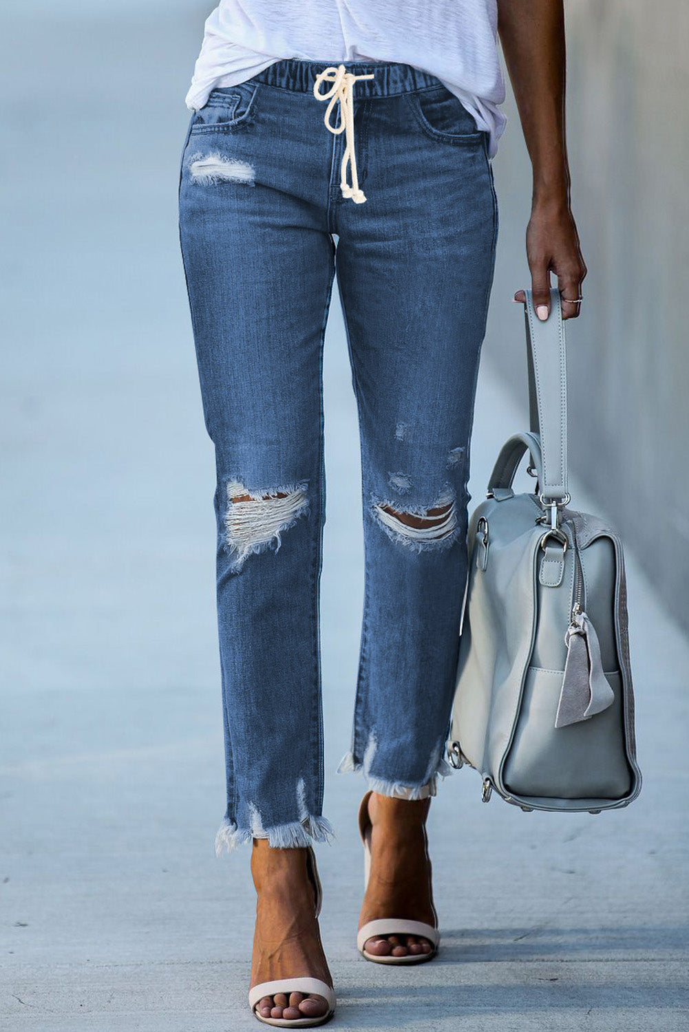 Dunkelblaue elastische Taille, gerade Beine zerstörte Rohsaum-Jeans