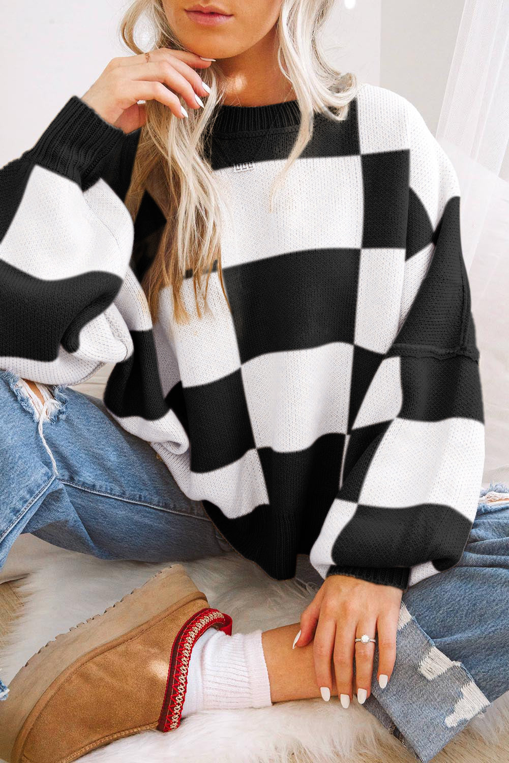 Pull à manches en damier rose à manches en évêque