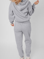 Ensemble de vêtements sportifs gris à coutures unis apparentes - Miniatuur