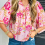 Bluse mit rosa Blumenmuster mit Krawattenausschnitt und Puff-Halbärmelbluse