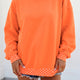 Sudadera oversized con acabado contrastante de lunares naranja