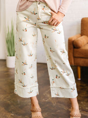 Vaqueros beige estilosos con estilo de ánade real, con puños y bajo - Imagen de moda femenina 1 - Miniatuur