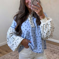 Tops de manga larga contrastados con estampado floral azul celeste - Foto 2