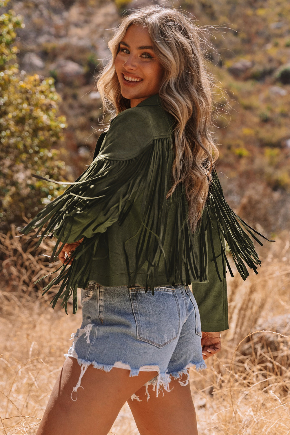 Veste verte à franges courtes en pseudo daim