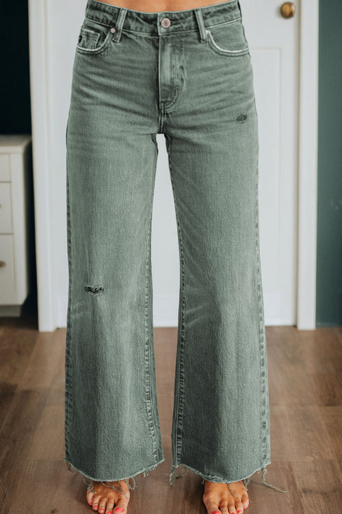 Jeans à quatre feuilles de trèfle, bordure brute légèrement vieillie, jambes larges